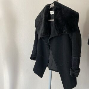 BB Dakota Black Fur trimmed Coat. Mid-length design.